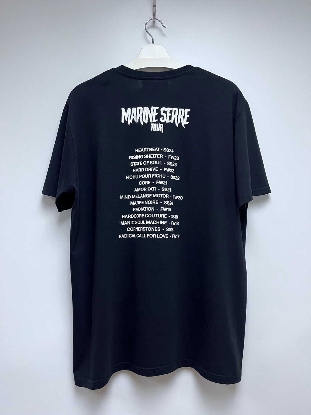 MARINE SERRE BLACK TOUR GRAPHIC T-SHIRT WITH A WOMAN HOLDING HER HEAD WITH COLLECTION DETAILS