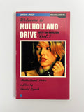 Book cover of 'Mulholland Drive' with a woman's face on a red background