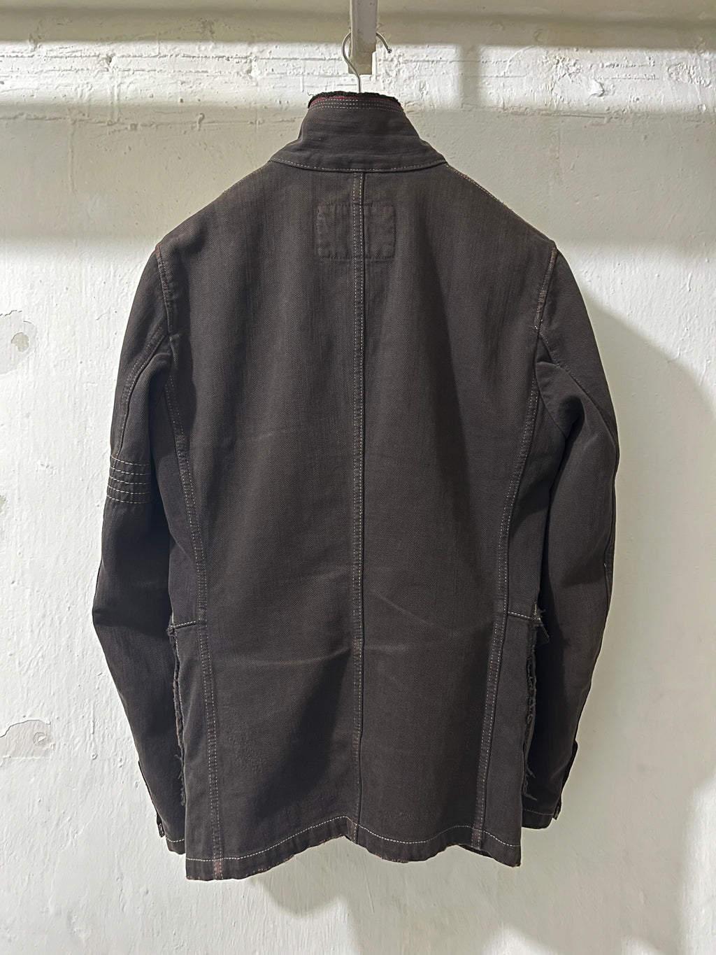 BROWN JACKET WITH VISIBLE STITCHING